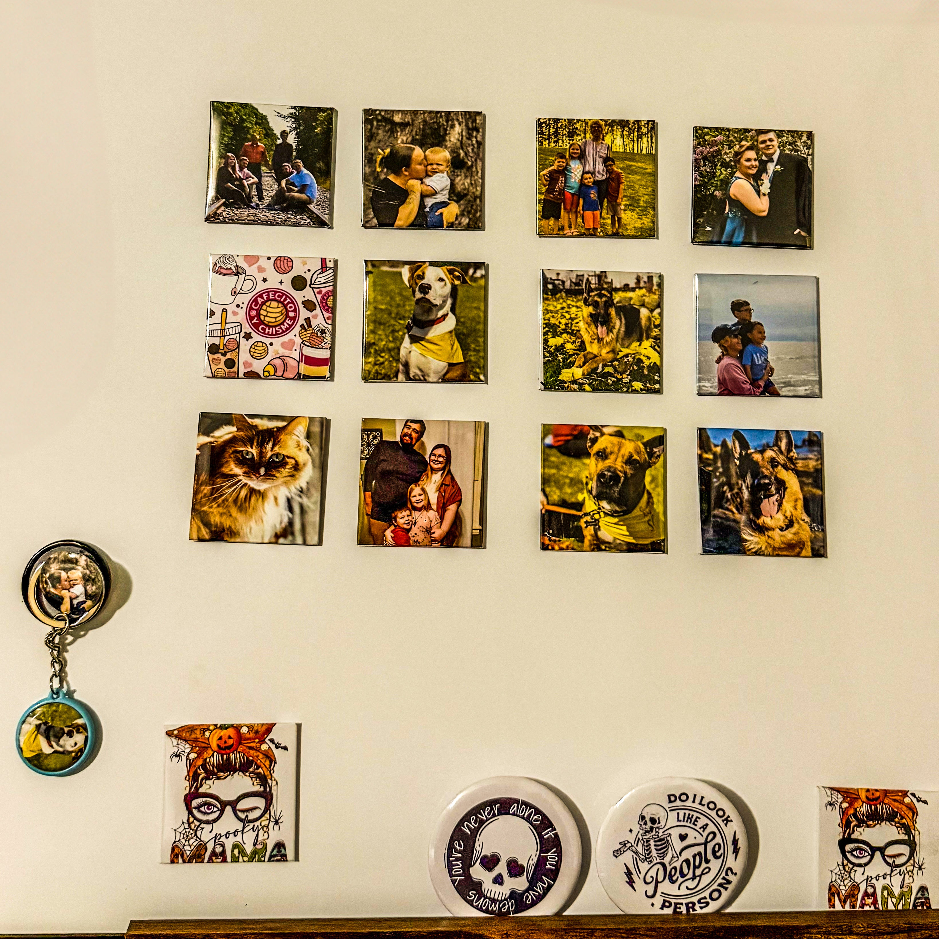 Collection of framed photos and decorative items on a wall